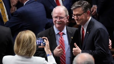 U.S. House of Representatives Speaker Mike Johnson poses for a picture with U.S. Representative John Rutherford (R-FL) (REUTERS)