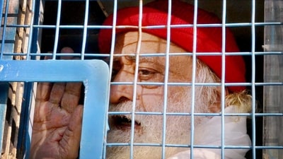 Asaram is also serving life sentence in another case of raping a minor girl at his ashram in Rajasthan in 2013. (PTI) Asaram is also serving life sentence in another case of raping a minor girl at his ashram in Rajasthan in 2013. (PTI)