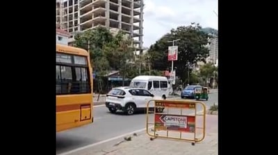 The footage, reportedly shot near the Shell petrol pump in Seegehalli, shows the SUV cruising on the wrong side. (X/@agrawalnavin) The footage, reportedly shot near the Shell petrol pump in Seegehalli, shows the SUV cruising on the wrong side. (X/@agrawalnavin)