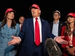 President Donald Trump, center, speaks with reporters as, from left, Agriculture Secretary Brooke Rollins, Rep. Zachary Nunn, R-Iowa, Rep. Randy Feenstra, R-Iowa, and Homeland Security Secretary Kristi Noem listen as they arrive on Air Force One, Friday, July 4, 2025, at Joint Base Andrews, Md. 
