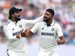 India's Mohammed Siraj celebrates after taking the wicket of England's Ben Stokes