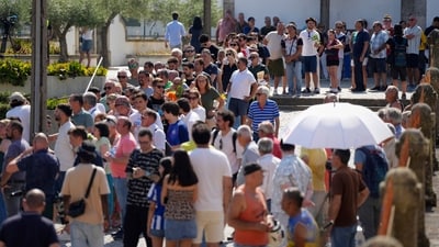 Mourners gather outside a church in Gondomar, near Porto, on July 4, 2025, where the bodies of Liverpool forward Diogo Jota and his brother André Silva have been brought for the wake and funeral. AP/PTI(AP07_04_2025_000449B) (AP) Mourners gather outside a church in Gondomar, near Porto, on July 4, 2025, where the bodies of Liverpool forward Diogo Jota and his brother André Silva have been brought for the wake and funeral. AP/PTI(AP07_04_2025_000449B) (AP)