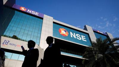 FILE PHOTO: People walk outside the National Stock Exchange (NSE) in Mumbai. (REUTERS) FILE PHOTO: People walk outside the National Stock Exchange (NSE) in Mumbai. (REUTERS)