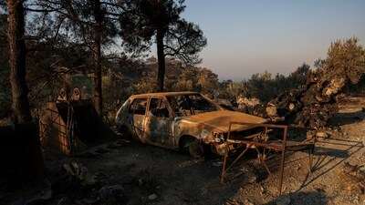 A destroyed car stands in the aftermath of a wildfire near Ierapetra, on the island of Crete, Greece, July 4, 2025. (Reuters)