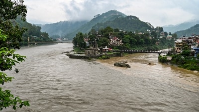 Swollen Beas river following heavy rainfall, in Mandi, Himachal Pradesh. (PTI) Swollen Beas river following heavy rainfall, in Mandi, Himachal Pradesh. (PTI)
