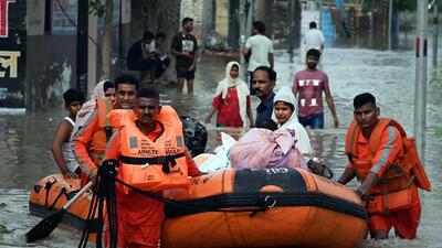 NDRF team rescue residents at as flood water enter residential colony in New Delhi on July 12, 2023. (Hindustan Times) NDRF team rescue residents at as flood water enter residential colony in New Delhi on July 12, 2023. (Hindustan Times)