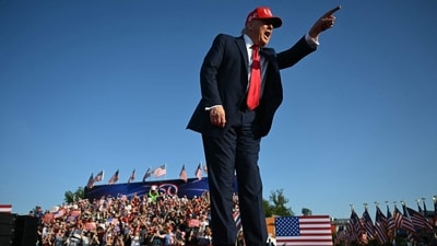 Donald Trump personally funded the $100,000 for the flagpole installations, highlighting them as fitting tributes to the nation's values during his Iowa rally. (Photo by ANDREW CABALLERO-REYNOLDS / AFP) (AFP) Donald Trump personally funded the $100,000 for the flagpole installations, highlighting them as fitting tributes to the nation's values during his Iowa rally. (Photo by ANDREW CABALLERO-REYNOLDS / AFP) (AFP)