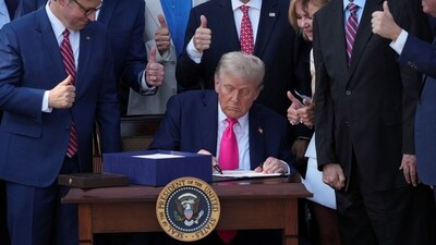 US President Donald Trump signs the sweeping spending and tax legislation, known as the "One Big Beautiful Bill Act," at the White House in Washington. (REUTERS)