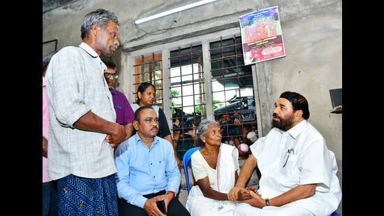 Minister VN Vasavan meets family members of D Bindu, who died after a portion of the Government Medical College in Kottayam collapsed on Thursday (PTI)