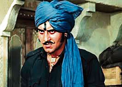 A still from Mera Gaon Mera Desh, a 1971 precursor to Sholay (1975), about a small-time thief and jailbird who must protect a village from a merciless daku. A still from Mera Gaon Mera Desh, a 1971 precursor to Sholay (1975), about a small-time thief and jailbird who must protect a village from a merciless daku.
