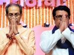 Shiv Sena UBT chief Uddhav Thackeray, with his brother and MNS Chief Raj Thackeray, greets during a joint rally in Mumbai Shiv Sena UBT chief Uddhav Thackeray, with his brother and MNS Chief Raj Thackeray, greets during a joint rally in Mumbai