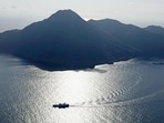 An aerial view shows a ferry carrying residents and visitors evacuating from Akuseki Island, as multiple earthquakes hit the island, a part of the Tokara island chain.