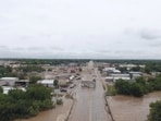 A drone view of a house swept down the road following torrential rains that unleashed flash floods along the Concho River in San Angelo, Texas, U.S., June 4, 2025, in this screen grab obtained from a social media video. 