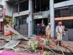 While one man was found dead inside a lift another body was found in the building during the cooling operation 
