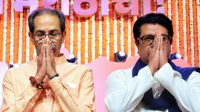 Shiv Sena UBT chief Uddhav Thackeray, with his brother and MNS Chief Raj Thackeray, greets during a joint rally in Mumbai (@ShivSenaUBT_ X) Shiv Sena UBT chief Uddhav Thackeray, with his brother and MNS Chief Raj Thackeray, greets during a joint rally in Mumbai (@ShivSenaUBT_ X)