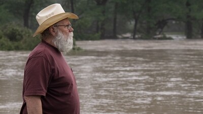 A resident affected by the Texas floods overlook the rising water levels near his home. (Eric Vryn/AFP) A resident affected by the Texas floods overlook the rising water levels near his home. (Eric Vryn/AFP)