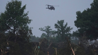 Choppers carry out rescue operations after Texas floods battered the area leading to multiple deaths and several others missing. (Eric Gay/AP) Choppers carry out rescue operations after Texas floods battered the area leading to multiple deaths and several others missing. (Eric Gay/AP)