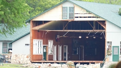 A wall is missing on a building at Camp Mystic along the banks of the Guadalupe River after a flash flood swept through the area Saturday, July 5, 2025, in Hunt, Texas. (AP Photo/Julio Cortez) (AP) A wall is missing on a building at Camp Mystic along the banks of the Guadalupe River after a flash flood swept through the area Saturday, July 5, 2025, in Hunt, Texas. (AP Photo/Julio Cortez) (AP)