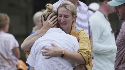 Family members stranded due to Texas floods embrace each other at a reunification center. (Eric Gay/AP) Family members stranded due to Texas floods embrace each other at a reunification center. (Eric Gay/AP)