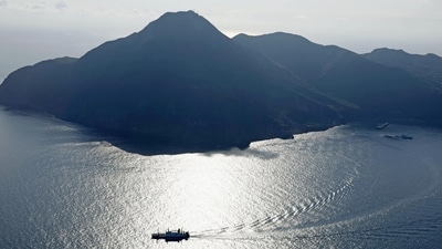 An aerial view shows a ferry carrying residents and visitors evacuating from Akuseki Island, as multiple earthquakes hit the island, a part of the Tokara island chain. (Kyodo via REUTERS)