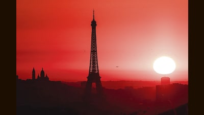 Paris is on red alert, with the top of the Eiffel Tower shut to visitors this week, amid a heat wave that has seen temperatures reach 41 degrees Celsius.The haze, incidentally, is from light reflecting off clouds of dust carried by strong winds. (AFP) Paris is on red alert, with the top of the Eiffel Tower shut to visitors this week, amid a heat wave that has seen temperatures reach 41 degrees Celsius.The haze, incidentally, is from light reflecting off clouds of dust carried by strong winds. (AFP)