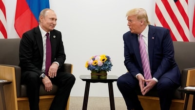 Russia's President Vladimir Putin and US President Donald Trump during a bilateral meeting at the G20 leaders summit in Osaka, Japan, June 28, 2019. (Reuters)