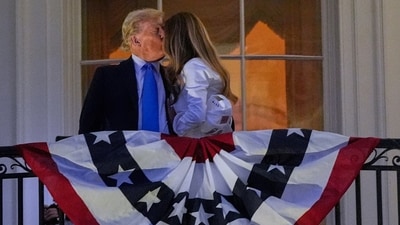 Trump and Melania kiss as they watch fireworks from the Truman Balcony of the White House Friday, July 4, 2025, in Washington. (AP Photo/Julia Demaree Nikhinson) (AP) Trump and Melania kiss as they watch fireworks from the Truman Balcony of the White House Friday, July 4, 2025, in Washington. (AP Photo/Julia Demaree Nikhinson) (AP)