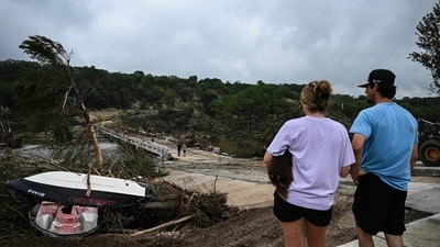 Rescuers were on Saturday searching for more than 20 girls missing from a riverside summer camp in the US state of Texas, after torrential rains caused devastating flooding that killed at least 27 people -- with more rain on the way. (AFP) Rescuers were on Saturday searching for more than 20 girls missing from a riverside summer camp in the US state of Texas, after torrential rains caused devastating flooding that killed at least 27 people -- with more rain on the way. (AFP)