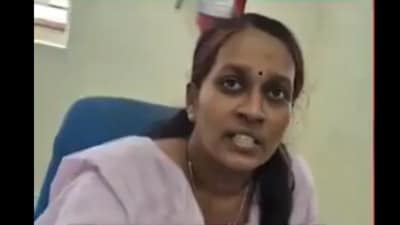 In the video, the woman, who claims she doesn’t know English, questions a Malayalam-speaking staff member at the counter. (X/@PrishaSargam) In the video, the woman, who claims she doesn’t know English, questions a Malayalam-speaking staff member at the counter. (X/@PrishaSargam)