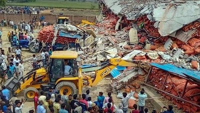 As the SUV struck a wall, the collision was so severe that the inter college building suffered heavy damage, and JCB machines had to be summoned for rescuing the occupants of the SUV. (HT Photo) As the SUV struck a wall, the collision was so severe that the inter college building suffered heavy damage, and JCB machines had to be summoned for rescuing the occupants of the SUV. (HT Photo)