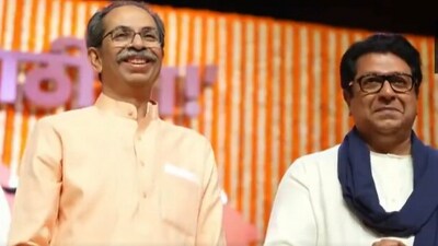 Uddhav and Raj Thackeray at their reunion rally in Mumbai's Worli on Saturday. (Screengrab from ANI) Uddhav and Raj Thackeray at their reunion rally in Mumbai's Worli on Saturday. (Screengrab from ANI)