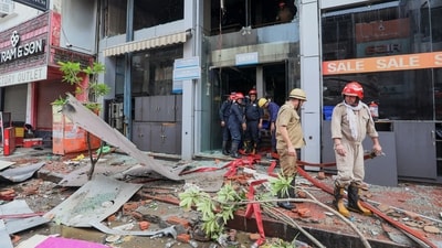 While one man was found dead inside a lift another body was found in the building during the cooling operation (PTI) While one man was found dead inside a lift another body was found in the building during the cooling operation (PTI)