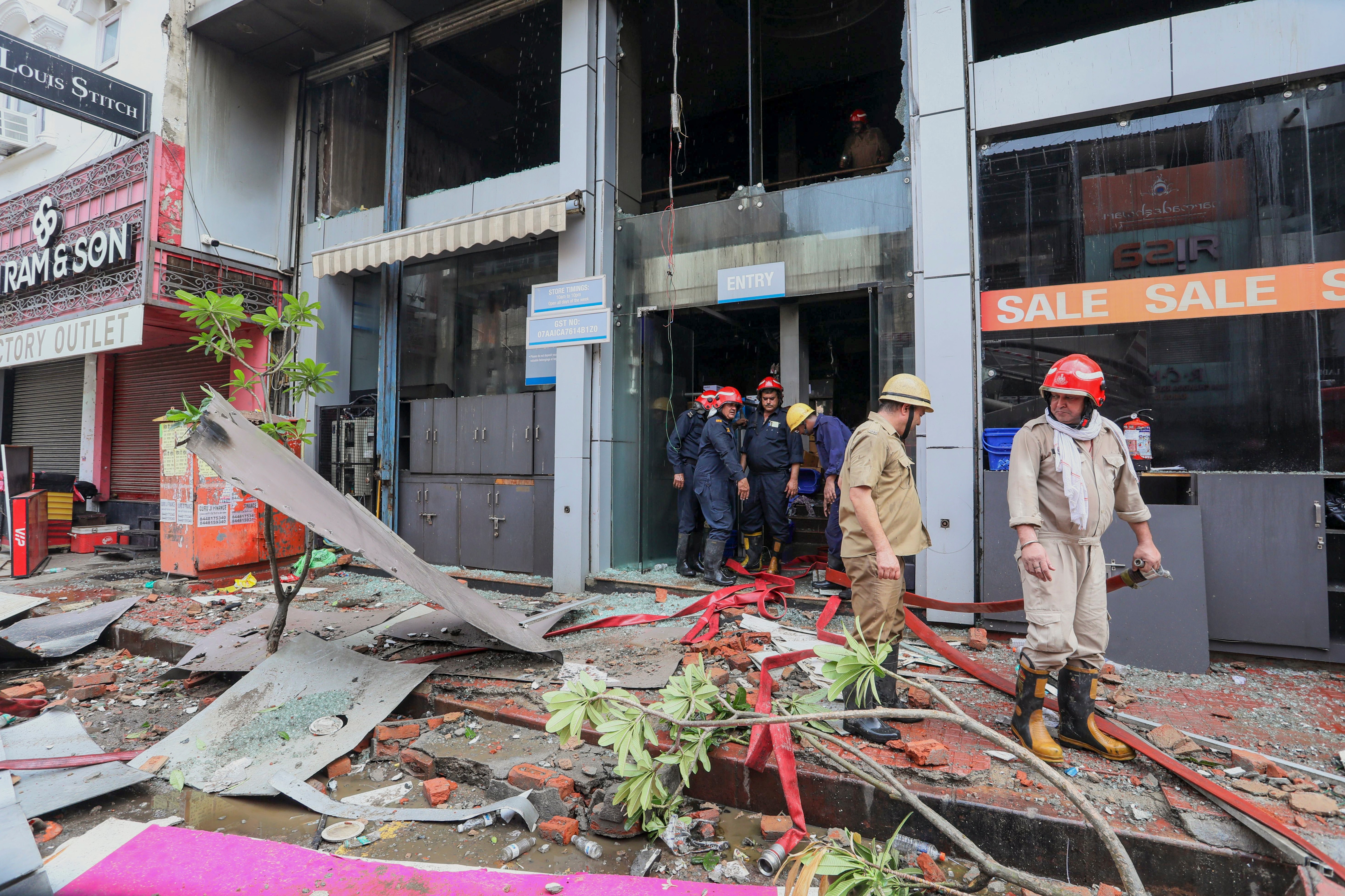 Fire personnel at a Vishal Mega Mart showroom, where a fire broke out on Friday, at Karol Bagh area, in New Delhi, Saturday, July 5, 2025. (PTI) Fire personnel at a Vishal Mega Mart showroom, where a fire broke out on Friday, at Karol Bagh area, in New Delhi, Saturday, July 5, 2025. (PTI)