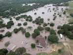 Houses and cars are partially submerged in flood waters in an aerial view near Kerrville, Texas, U.S. July 4, 2025. 