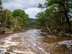 Searchers used helicopters, boats and drones to look for victims and rescue stranded people after the flash floods in Texas.