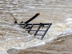 CENTER POINT, TEXAS - JULY 05: Debris sits in the Guadalupe River after flash flooding damaged nearby buildings on July 5, 2025 in Center Point, Texas. Heavy rainfall caused flooding along the Guadalupe River in central Texas with multiple fatalities reported. (Photo by Jim Vondruska / GETTY IMAGES NORTH AMERICA / Getty Images via AFP) CENTER POINT, TEXAS - JULY 05: Debris sits in the Guadalupe River after flash flooding damaged nearby buildings on July 5, 2025 in Center Point, Texas. Heavy rainfall caused flooding along the Guadalupe River in central Texas with multiple fatalities reported. (Photo by Jim Vondruska / GETTY IMAGES NORTH AMERICA / Getty Images via AFP)