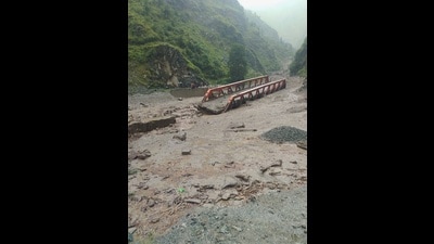 A bridge washed away in Chamba after flash floods in Himachal Pradesh on Sunday. (HT Photo) A bridge washed away in Chamba after flash floods in Himachal Pradesh on Sunday. (HT Photo)