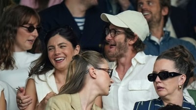 Andrew Garfield and Monica Barbaro were spotted at Wimbledon, sparking dating rumors. (AP Photo/Alastair Grant) (AP) Andrew Garfield and Monica Barbaro were spotted at Wimbledon, sparking dating rumors. (AP Photo/Alastair Grant) (AP)