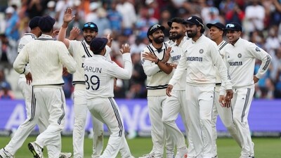 India's Akash Deep celebrates with teammates after taking the wicket of England's Jamie Smith (Action Images via Reuters)