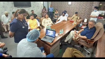 Health minister Dr Balbir Singh visited Moga on Sunday, where Dr Aniljit Kamboj, stepfather of popular film actor Tania is being treated at a superspecialty hospital for gunshot wounds. (HT Photo)
