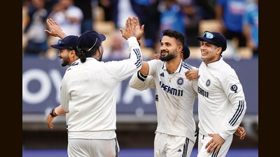 Indian players celebrate their historic victory in the second test against England on Sunday. (AP) Indian players celebrate their historic victory in the second test against England on Sunday. (AP)