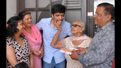 Madhur Goyal celebrating his feat with his family in Ludhiana on Sunday. (Manish/HT) Madhur Goyal celebrating his feat with his family in Ludhiana on Sunday. (Manish/HT)