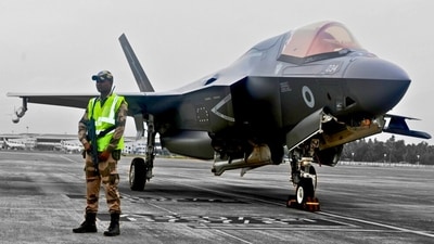 A CISF personnel stands guard near the British F-35 fighter jet that made an emergency landing after running low on fuel at the Thiruvananthapuram International Airport on June 14, 2025. (@CISFHQrs)