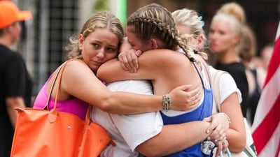 Campers embrace after arriving to a reunification area as girls from Camp Waldemar, near the North fork of the Guadalupe River, are reconnected with their families after heavy rainfall in Central Texas, Saturday, July 5, 2025. (AP) Campers embrace after arriving to a reunification area as girls from Camp Waldemar, near the North fork of the Guadalupe River, are reconnected with their families after heavy rainfall in Central Texas, Saturday, July 5, 2025. (AP)