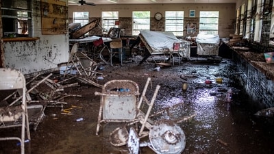 Furniture scattered inside a cabin at Camp Mystic after deadly flooding in Kerr County, Texas, U.S., July 5, 2025. (REUTERS/Sergio Flores)