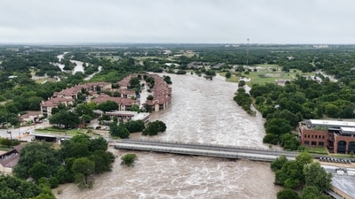 A drone view shows the swollen San Gabriel river, in Georgetown, Texas, U.S. July 5, 2025 in this screen grab from social media video. (Adam Grumbo via REUTERS)