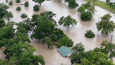 A drone view shows an area flooded by the swollen San Gabriel river, in Georgetown, Texas, U.S. July 5, 2025 in this screen grab from social media video. (Adam Grumbo/via REUTERS) (Adam Grumbo via REUTERS)