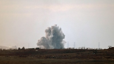 This picture taken from a position at Israel's border with the Gaza Strip shows smoke billowing during an Israeli strike on the besieged Palestinian territory. (AFP) This picture taken from a position at Israel's border with the Gaza Strip shows smoke billowing during an Israeli strike on the besieged Palestinian territory. (AFP)