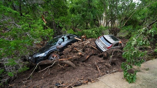 Heavy rain fell in a matter of hours on Texas Hill Country in the central part of the state. The rain inundated communities and left scores of people dead and missing.(AP Photo)