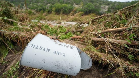 A Camp Mystic mailbox is seen near the entrance to the establishment along the banks of the Guadalupe River after a flash flood swept through the area.(AP/Julio Cortez)